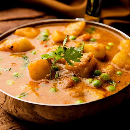 Aloo Mattar with Brown Gravy